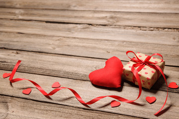 Heart and gift box with red ribbon