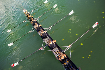 Boat coxed eight Rowers rowing on the tranquil lake - obrazy, fototapety, plakaty