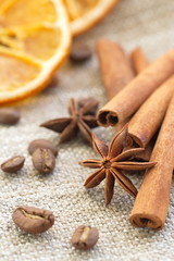 Obraz na płótnie Canvas Cinnamon, anise, orange and nuts