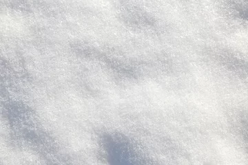 Rolgordijnen Shiny white soft snow closeup texture © viperagp