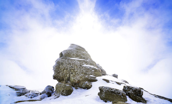 Romanian sphinx in Busteni, bucegi mountain in winter season