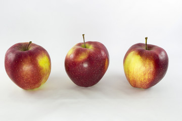 Three red apples