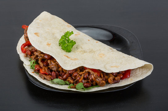 Burrito with minced meat and beans