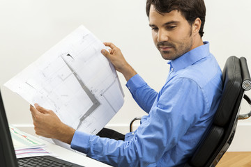 Successful businessman working in his office