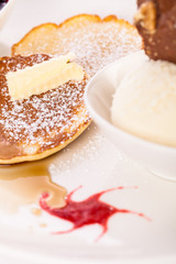 tasty sweet pancakes with vanilla icecream and topping