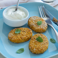 Healthy vegetable cutlets with carrot, breaded in oat bran