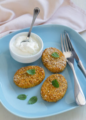 Healthy vegetable cutlets with carrot, breaded in oat bran