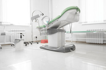 Gynecological chair in gynecological room