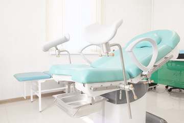 Gynecological chair in gynecological room