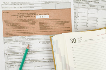 Polish tax form with pencil and calendar