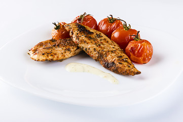 Grilled chicken breast with tomatoes
