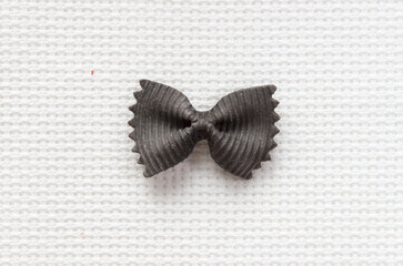 Italian bows farfalle pasta from durum wheat,  top view