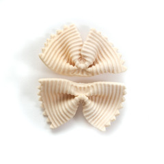 Italian bows farfalle pasta from durum wheat,  top view