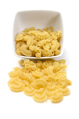 Italian pasta in a porcelain bowl on white background