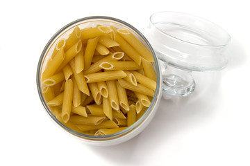 Italian pasta in a glass container with a lid