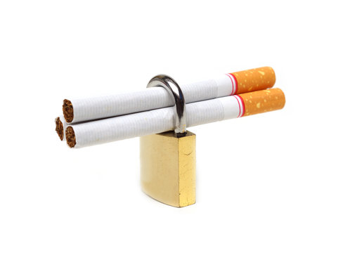Cigarettes in a security lock - stop smoking concepts