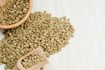 Fototapeta premium lentils, on table cloth, background, close up