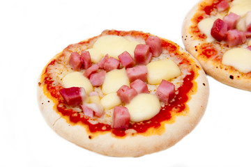 Mini pizzas with ham on white background