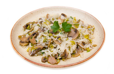 Risotto with mushrooms on a white background