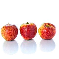 Sweet ripe red apples isolated on white background