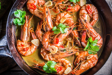 Tasty king prawns with garlic and red peppers