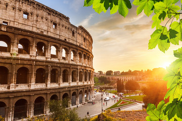 Naklejka premium Colosseum at sunset