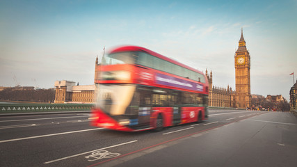 Blurred double decker with Westminster and Big Ben on background