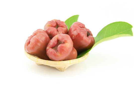 rose apple on basket isolated on white background