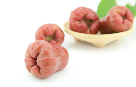 rose apple on basket isolated on white background