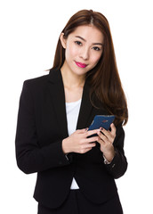 Fototapeta premium Young businesswoman with smartphone