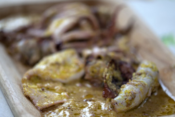 squids at the orange sauce