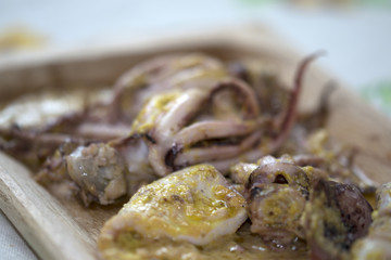 squids at the orange sauce