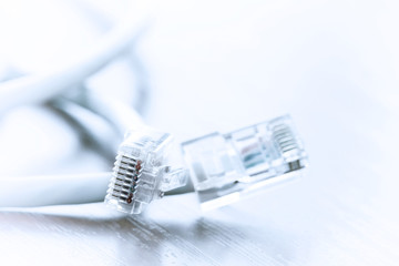 close up of RJ45 Plug Lan Network on wood desk