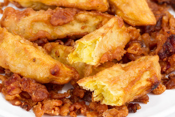 deep fired yam on white background