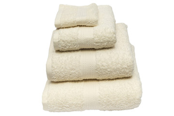 Folded bath towels on isolated white background