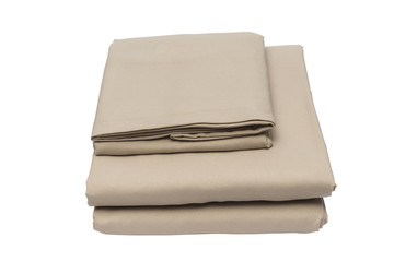 Folded bed linen on white isolated background