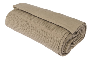 Brown cotton blanket rolled on a white background