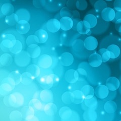 Blue bokeh abstract light background.