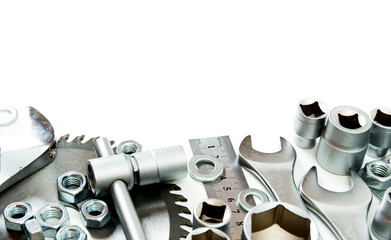 Fototapeta premium Metalwork. Spanner, ingot and others tools on white background.