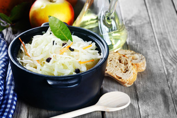 Shredded Cabbage on Cooking Pot with Herbs