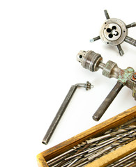 Vintage working tools ( drill and more) on white background.