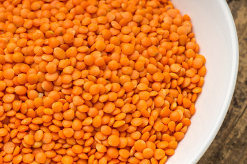 Raw lentil in bowl