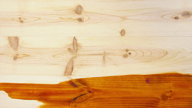 Timelapse of painting smooth wooden board with cherry color