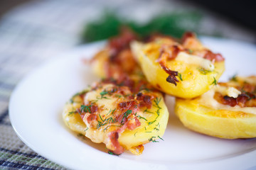 baked potato with bacon and cheese