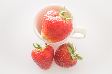 Fresh ripe strawberries on white background