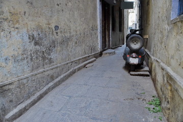 Gali (narrow pedestrian alleyway) in Varanasi, India.