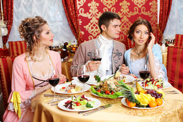 company in the vintage clothing have fun in  restaurant