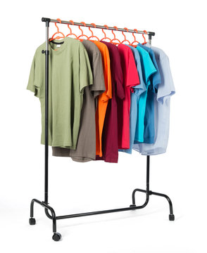 Mobile rack with clothes on white background.