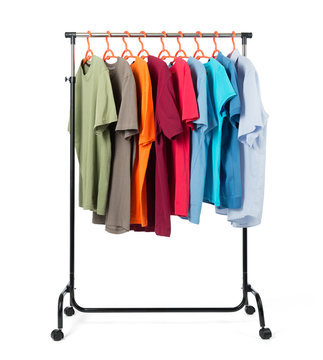 Mobile rack with clothes on white background.