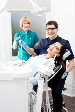 Dentist ready to examine the patient